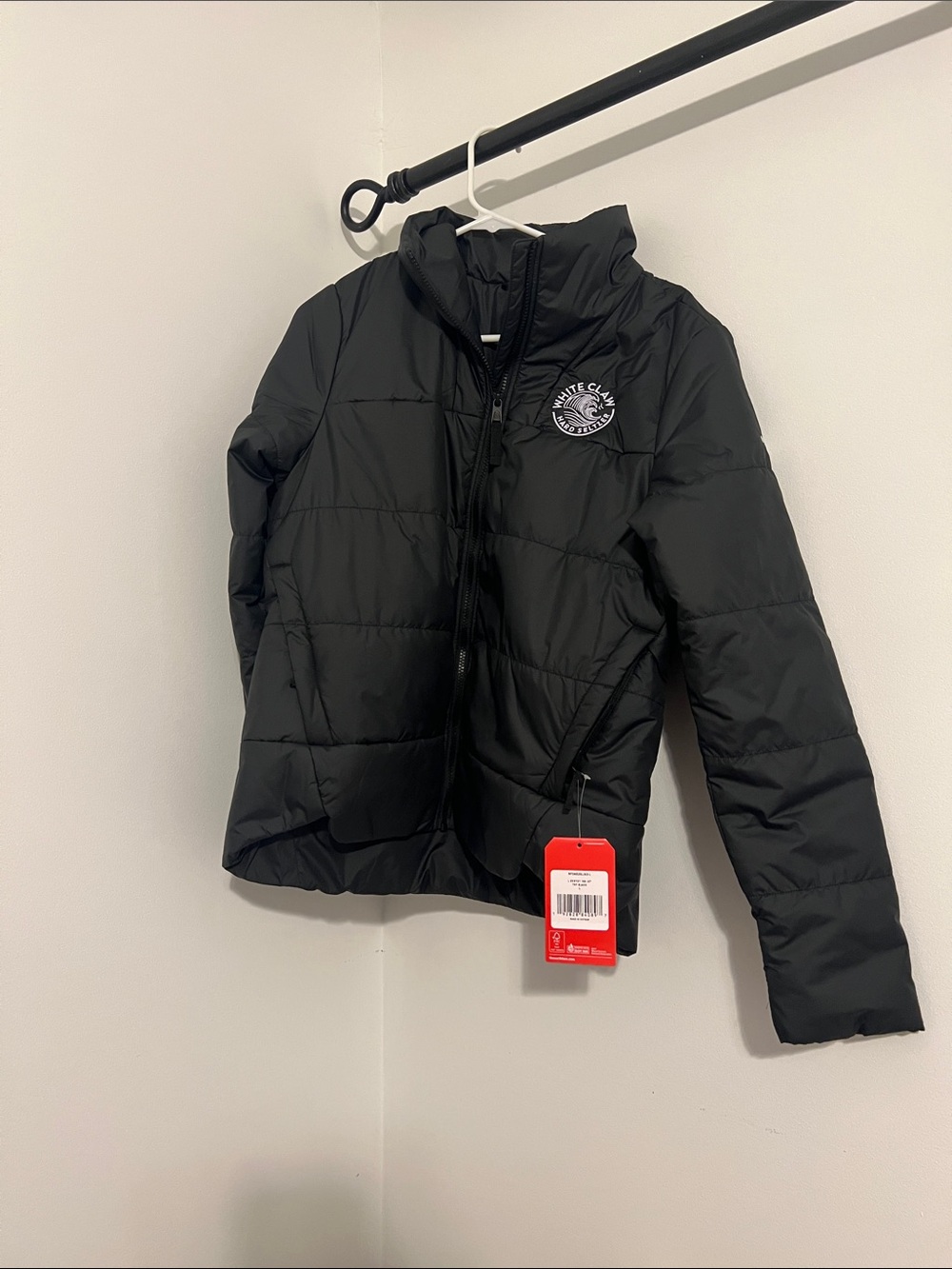 The North Face Black Quilted Puffer Jacket with white claw logo